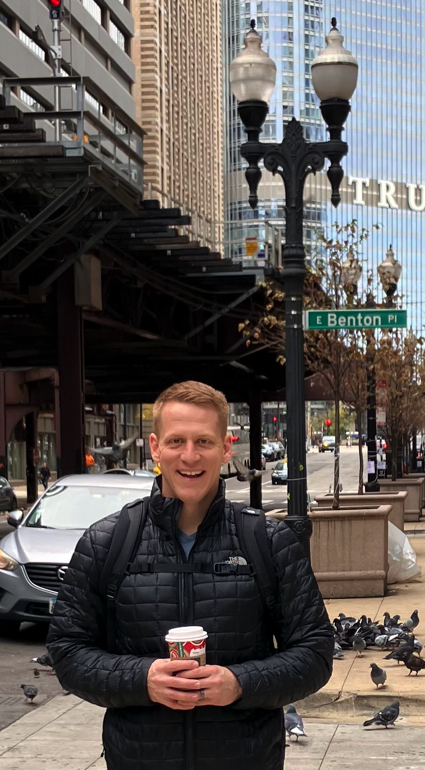It's me!  By a lamp post!  With my name on it! And a ton of pigeons...